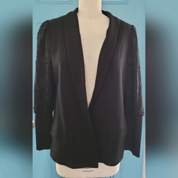 One button jacket with bishop lace sleeves. - Picture 1 of 4